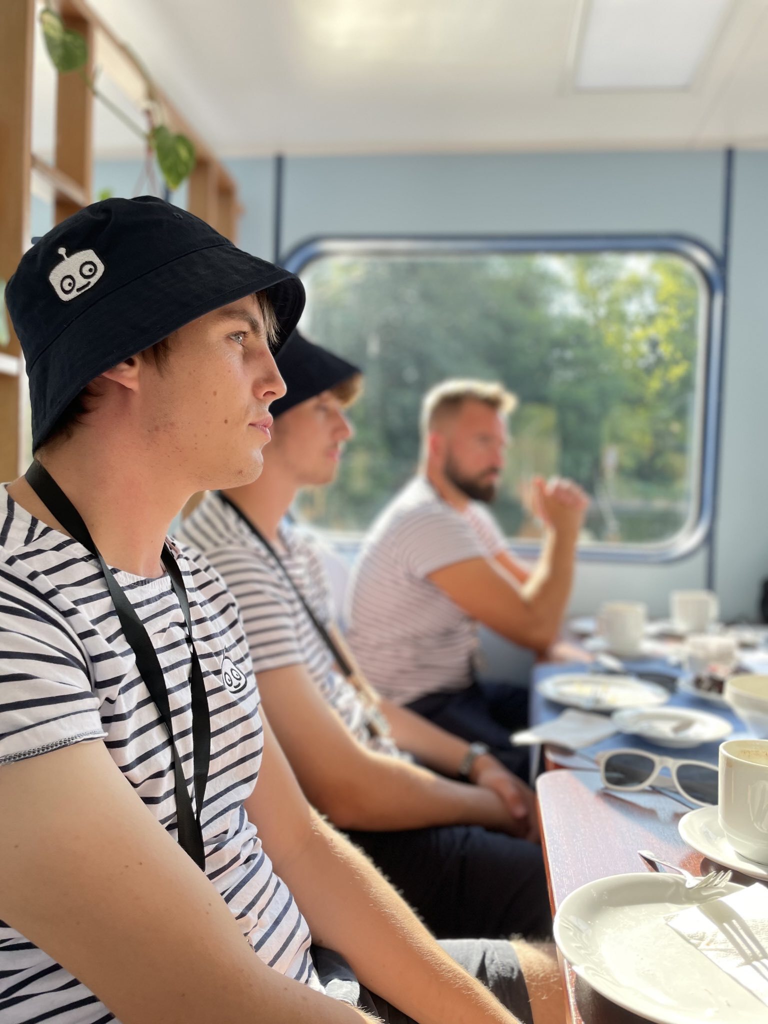 Antoine enjoying a conversation with the team on the boat